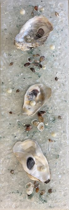 Artwork with Oyster shells made in the "Oyster Bay" art class at Seaside Expressions in Punta Gorda, FL